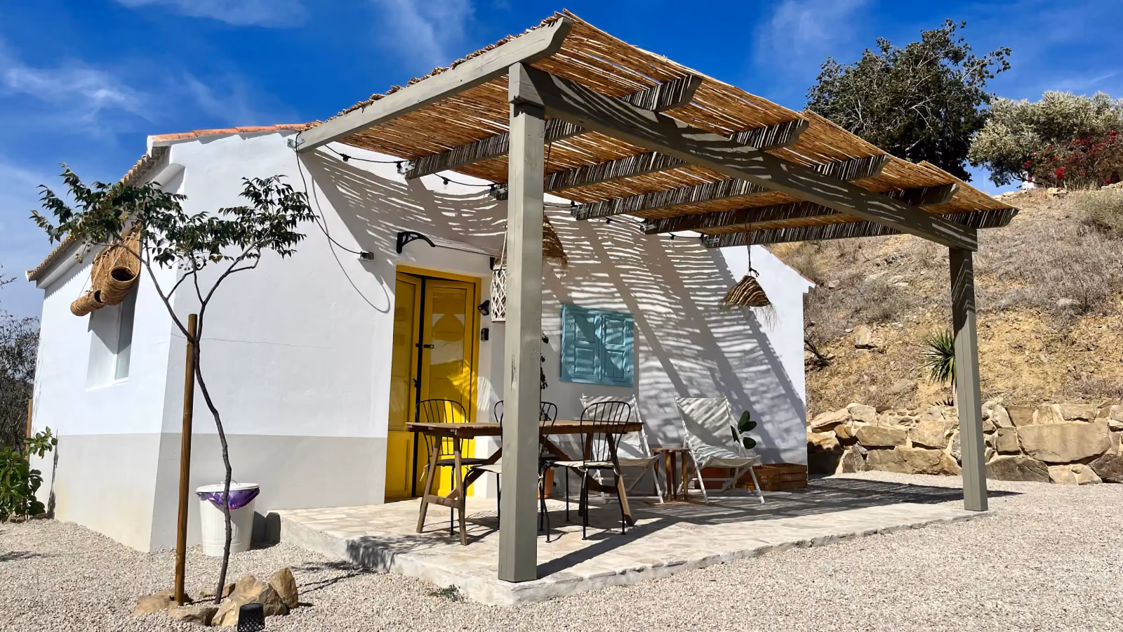 Casita exterior with reed pergola